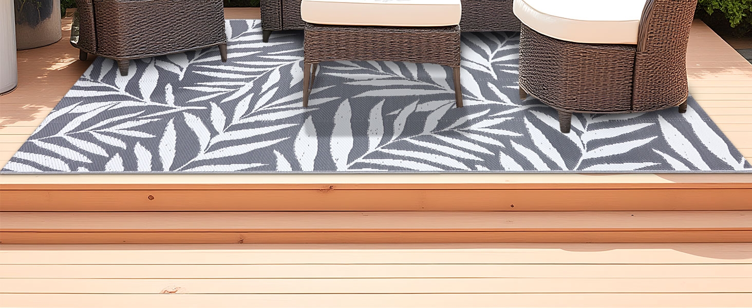 grey and white outdoor rug